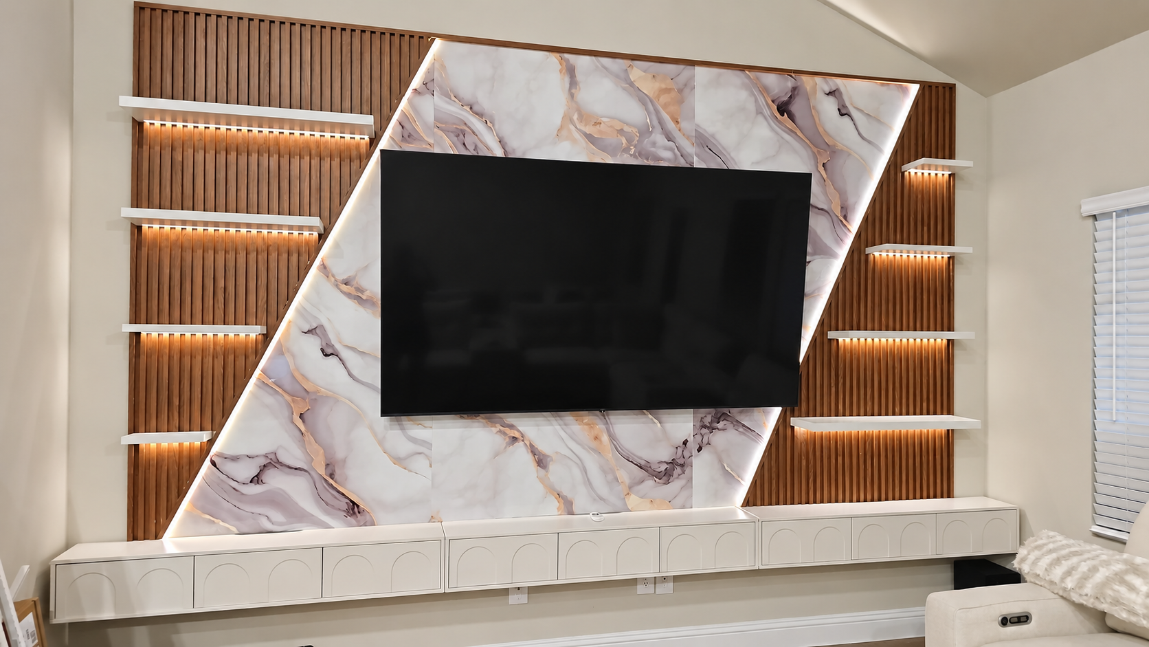 TV feature wall with slatted panels, shelves and lighting